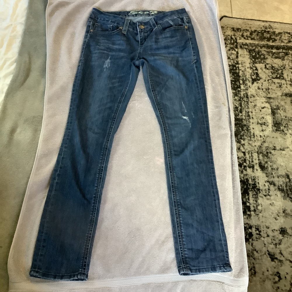 7 For All Mankind Slim Straight lightly distressed jeans. Size 4.